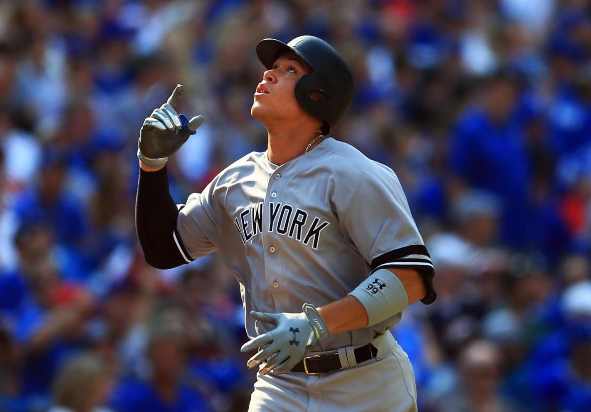 Aaron+Judge+points+to+the+sky+after+hitting+his+48th+home+run+of+the+season+Sunday+afternoon%2C+one+shy+of+tying+MLB+rookie+record.+%28Via+Vaughn+Ridley%2FGetty+Images%29