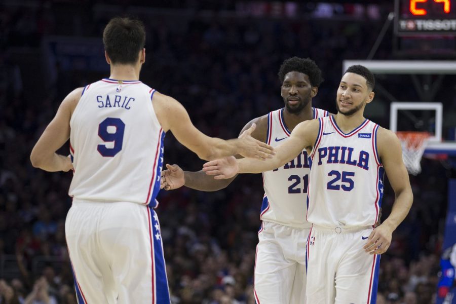 Pictured from left to right: Dario Saric (#9), Joel Embiid (#21), and Ben Simmons (#25). (Via Mitchell Leff/Getty Images)