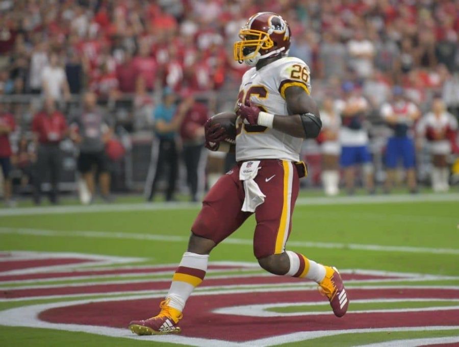 Washington Redskins runningback, Adrian Peterson (26) rushed for his 100th career touchdown in Washingtons 24-6, week one defeat over the Arizona Cardinals. (John McDonnell/The Washington Post)