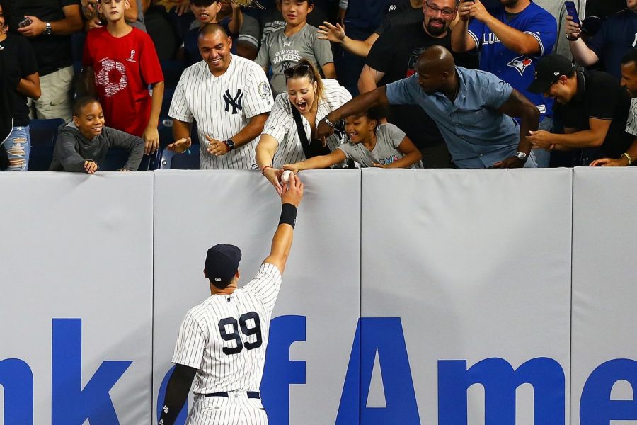 Aaron Judge #99 returned to a standing ovation Friday night at Yankee Stadium as he entered to the game to play right field after missing 48 games with a fractured right wrist. (Mike Stobe / Getty Images)
