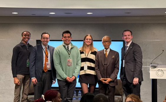 Pictured, left to right: Ujunwa Ike '25; Dr. Nicholas Hirshon; Alexander Felix '25; Julia Menn '28; Reverend Al Sharpton; and William Gifford '28