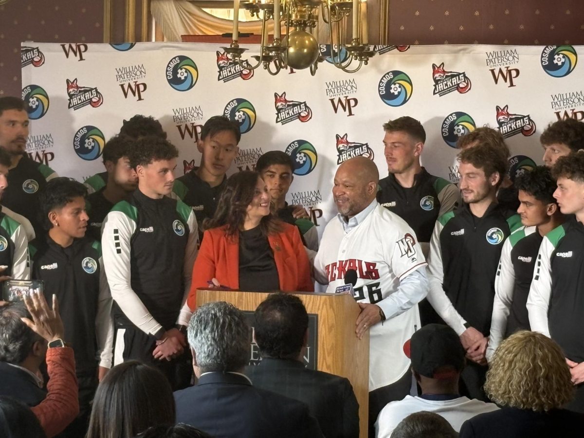 Benjie Wimberly, Carol Cuadrado, and members of the NY Cosmos and NY Jackals 
